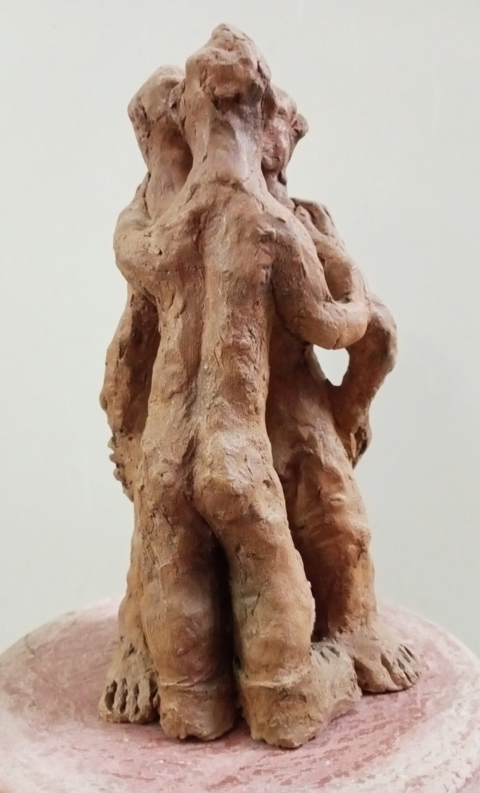 Three figures (terracotta)
