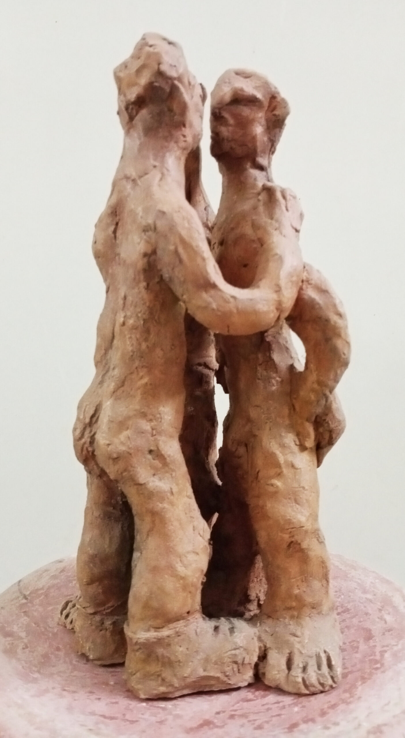 Three figures (terracotta)