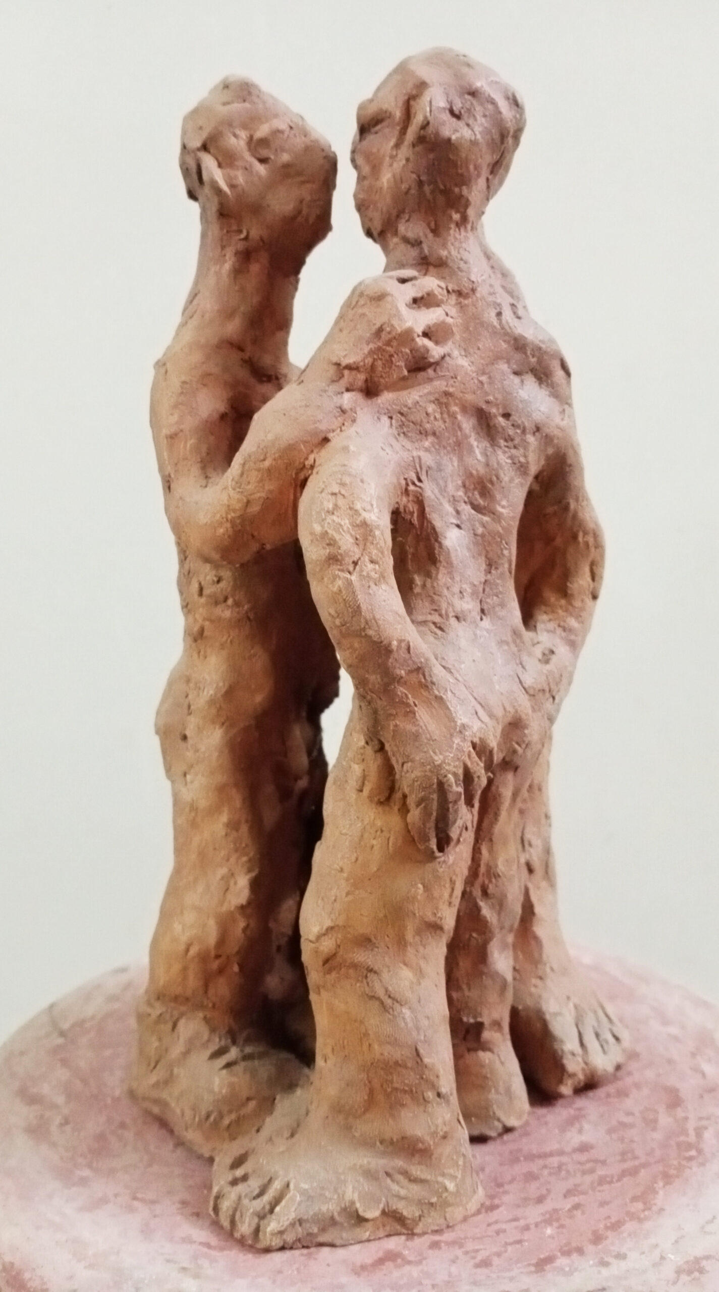 Three figures (terracotta)