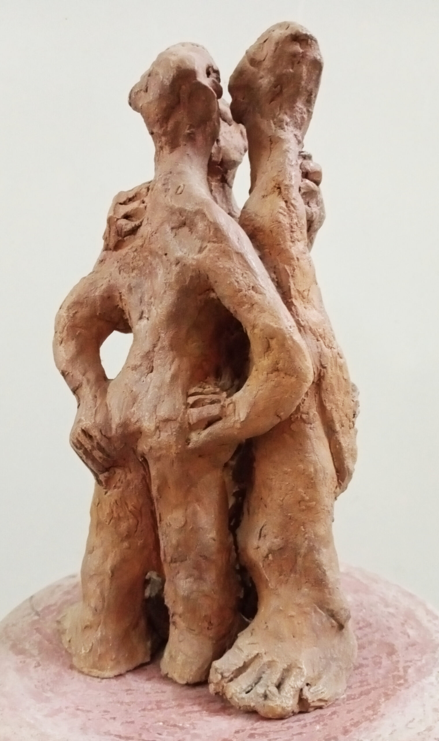 Three figures (terracotta)