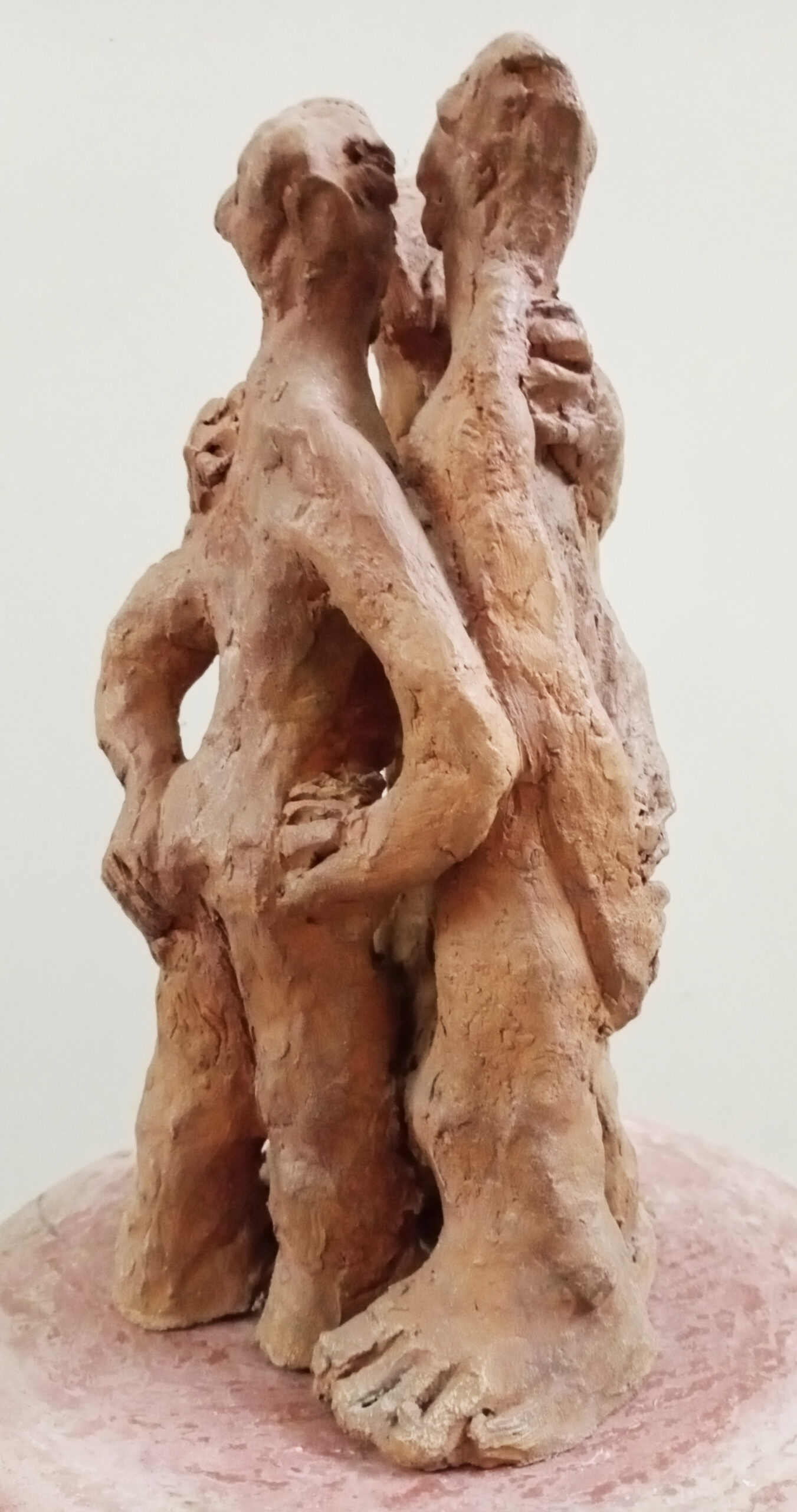 Three figures (terracotta)