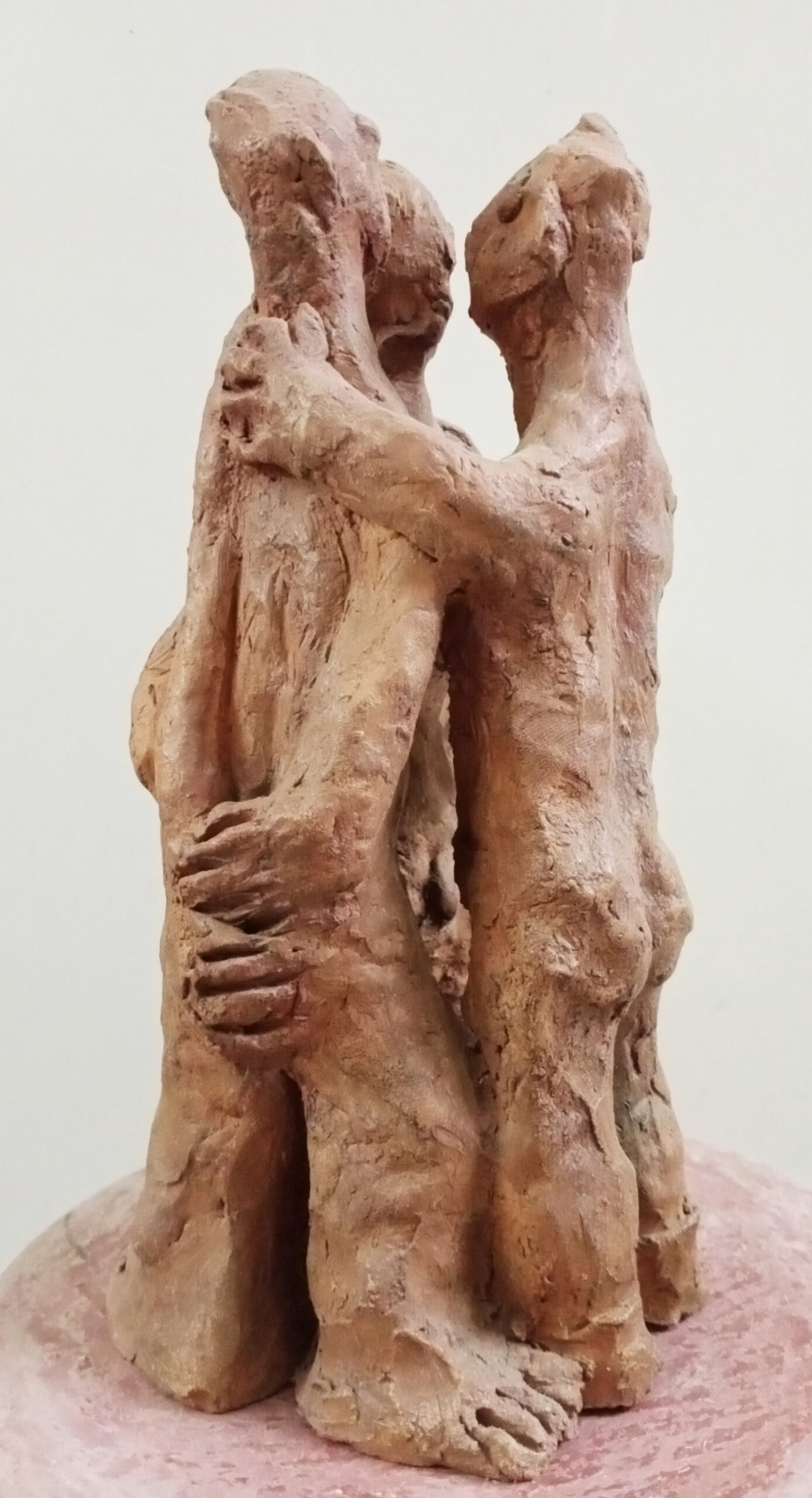 Three figures (terracotta)
