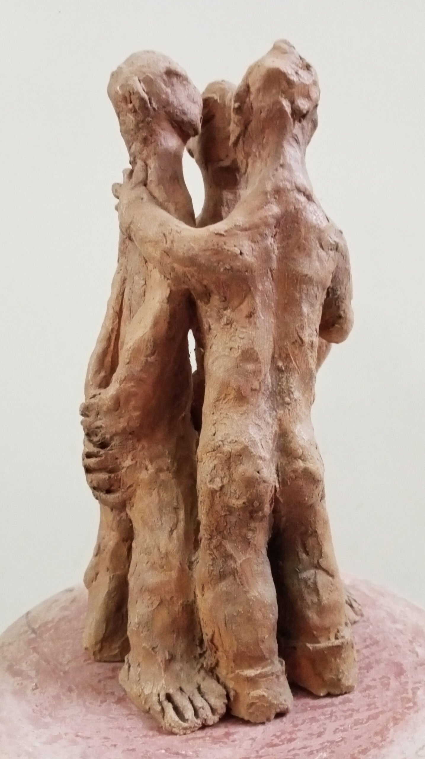 Three figures (terracotta)